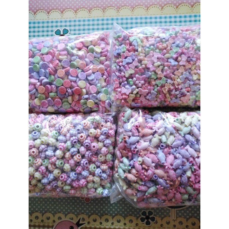 Mote manik meronce putih motif warna 50 gr