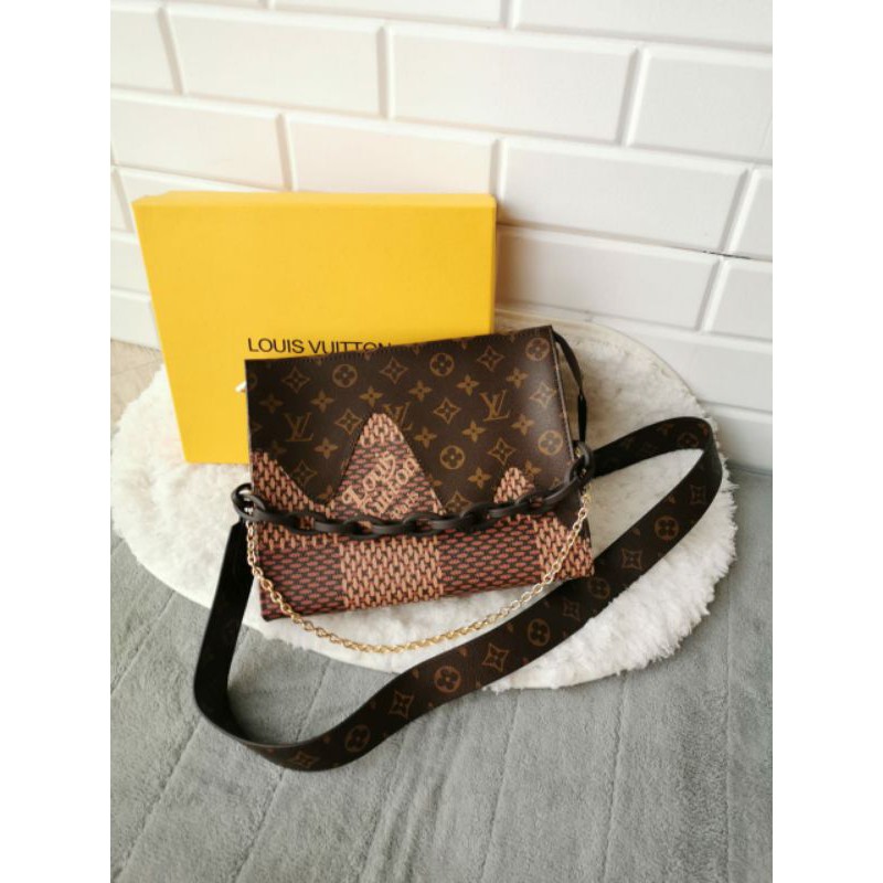 LV NIGO TOILETRY BAG WITH LONG STRAP