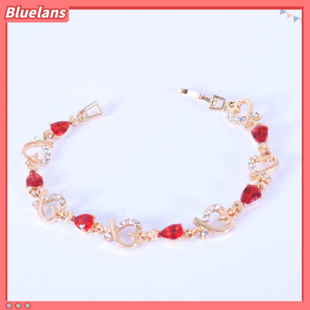 Gelang Rantai Desain Hati Hollow Aksen Berlian Imitasi Warna Merah Bahan Alloy Untuk Wanita