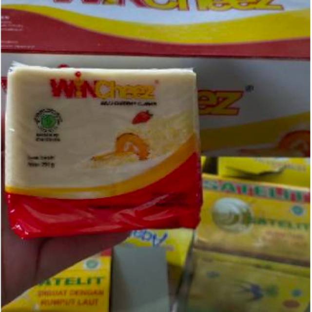 

Keju Cheddar / Keju Parut Winchezz 250Gr