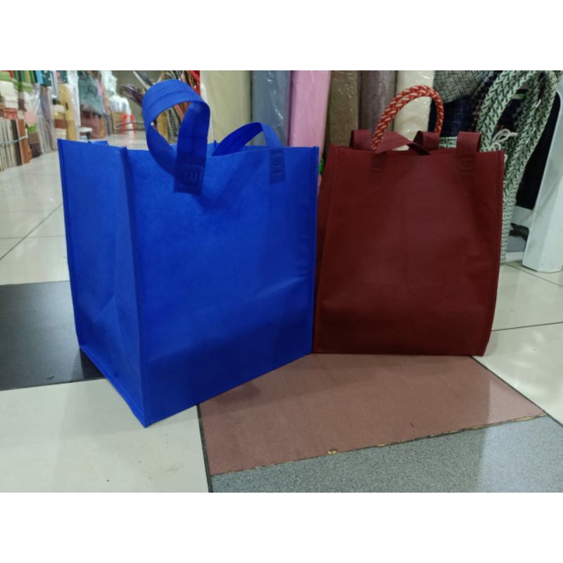 

tas kain spunbond buat nasi box22&23 isi 12 pcs terlaris dan termurah bahan 75