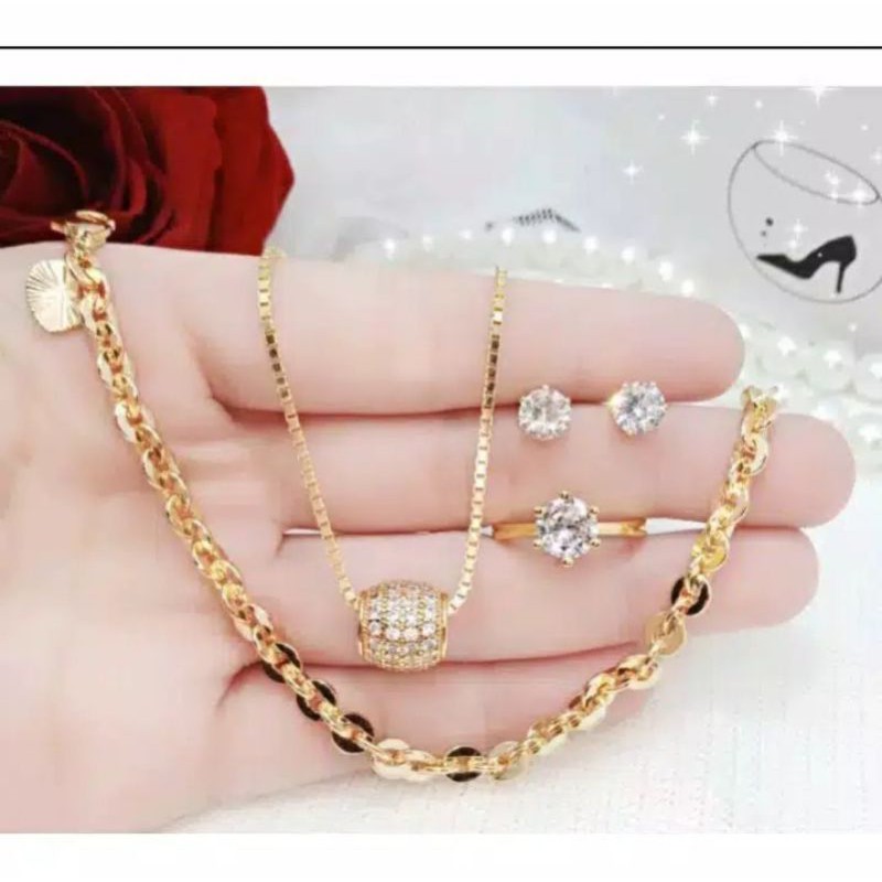 perhiasan wanita satu set liontin kolong mata satu simple gelang nuri