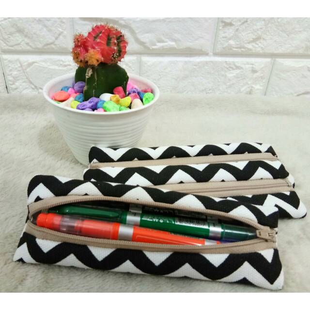 

SOUVENIR POUCH KANVAS (TEMPAT PENSIL)