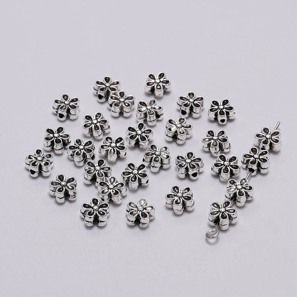 50pcs / Lot Manik-Manik Bunga Tibet Antik Bahan Metal Ukuran 6mm Untuk Membuat Perhiasan Diy