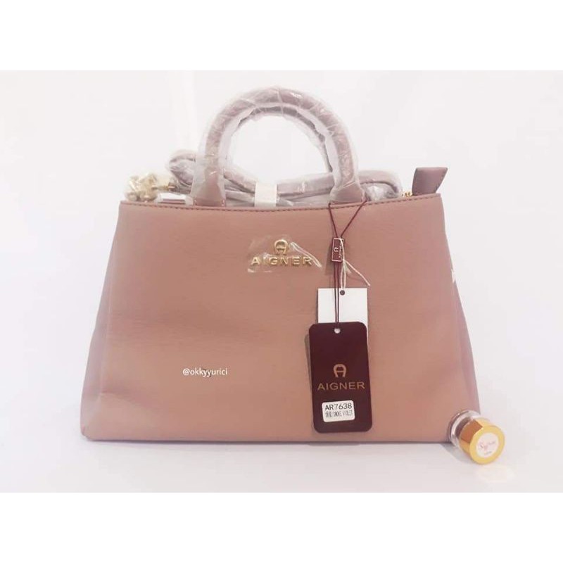 tas aigner