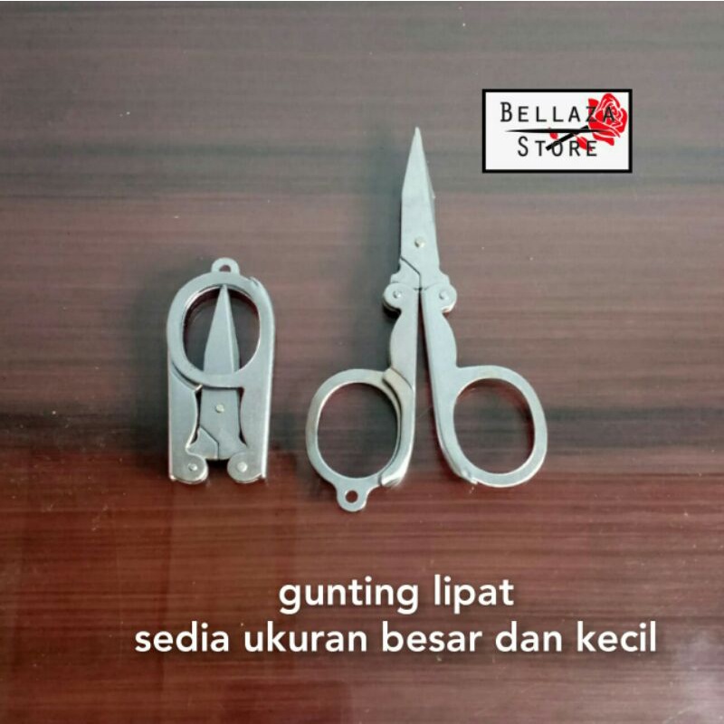 

Gunting Lipat / Trip Scissors
