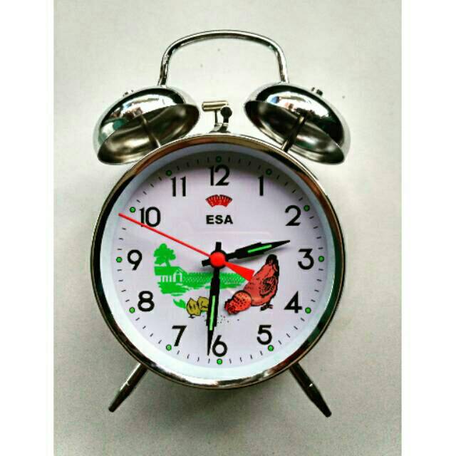Jam weker kepala ayam mematuk
