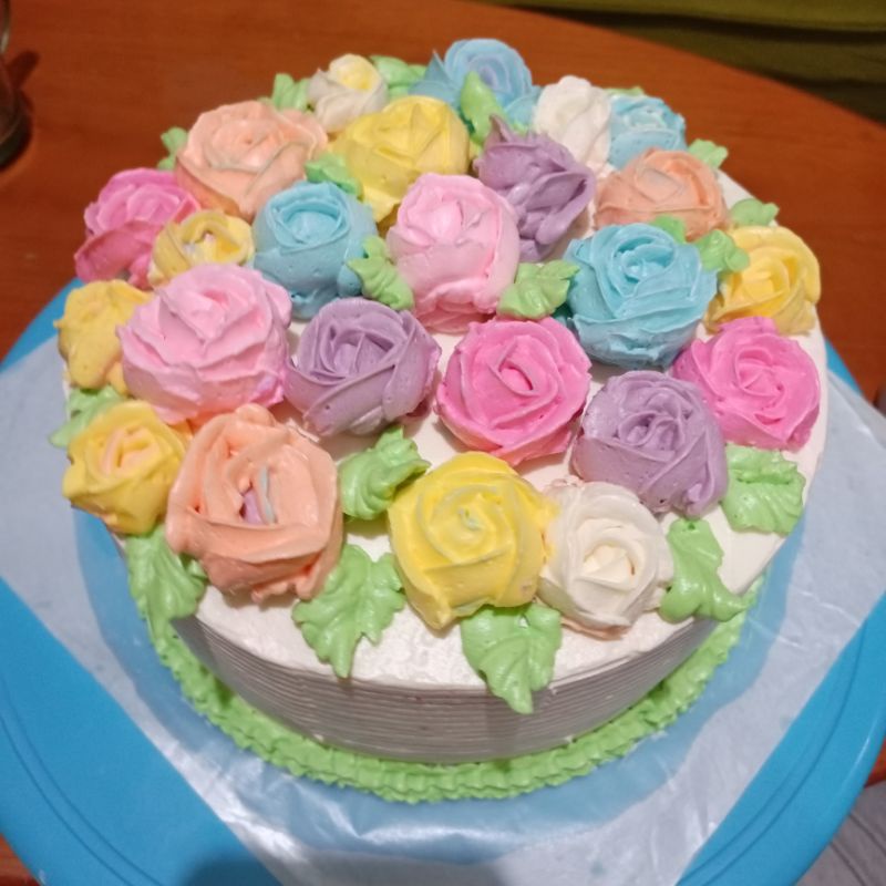 

KUE ULANG TAHUN RAINBOW MAWAR