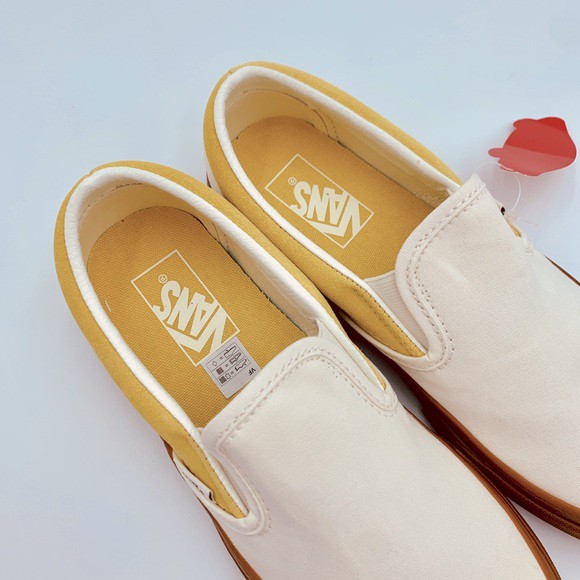 vans slip on cream white