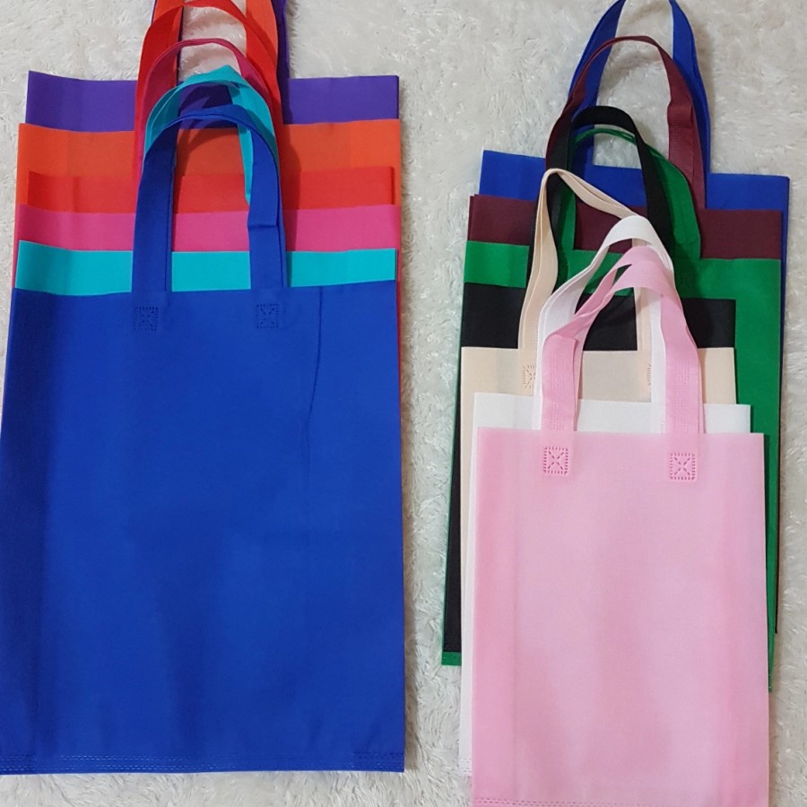 Tas goodie bag tas spunbond polos / tas kain / tas tenteng 38x45 cm