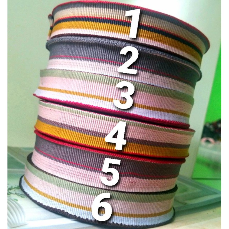 

per gulungan 15 meter,pita salur pelangi lebar 2cm.