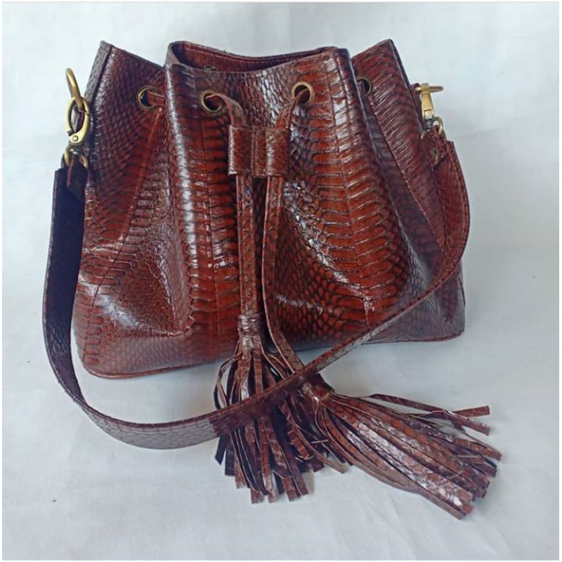 tas serut kulit ular
