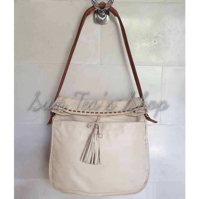 FRANCESCO BIASIA Cream two tone tassel shoulder bag.