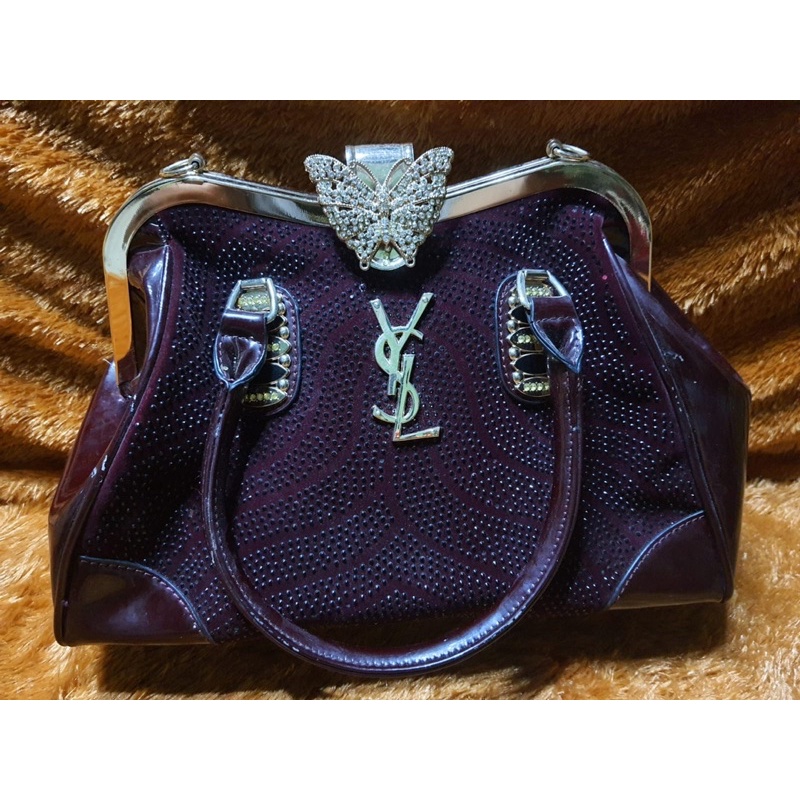Tas pesta YSL
