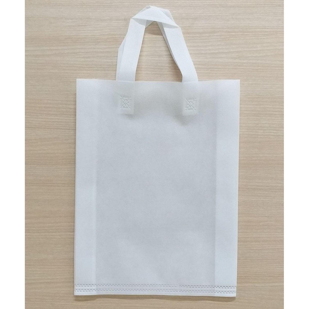 

GOODIE BAG SPUNBOND HANDLE 30x40 / Tas Belanja Murah / Kantong Belanja / Souvenir (Putih)