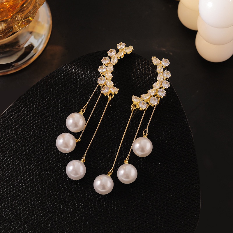 S925 Korea Mutiara rumbai anting-anting panjang anting-anting desain minimalis Wanita anting-anting