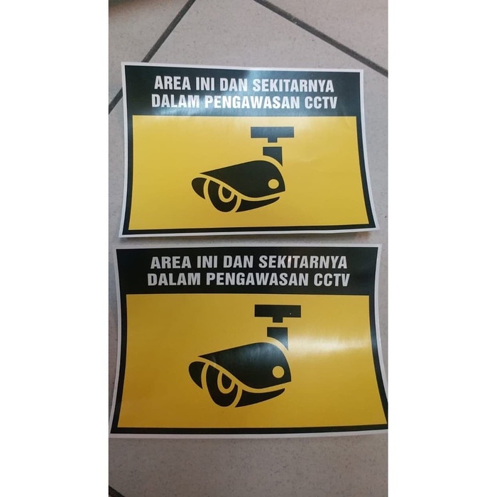 

SIGN LABEL STICKER AREA INI DAN SEKITARNYA DALAM PENGAWASAN CCTV