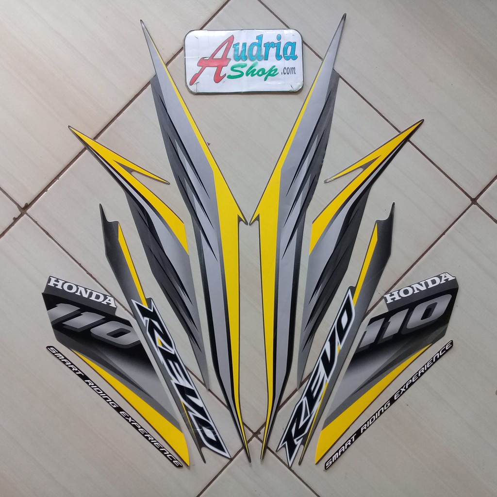 Sticker striping motor honda revo cw 110 2009 kuning