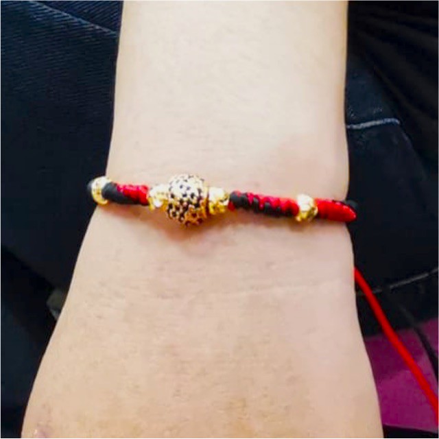 Gelang tali rajut bulat variasi lapis emas mata hitam