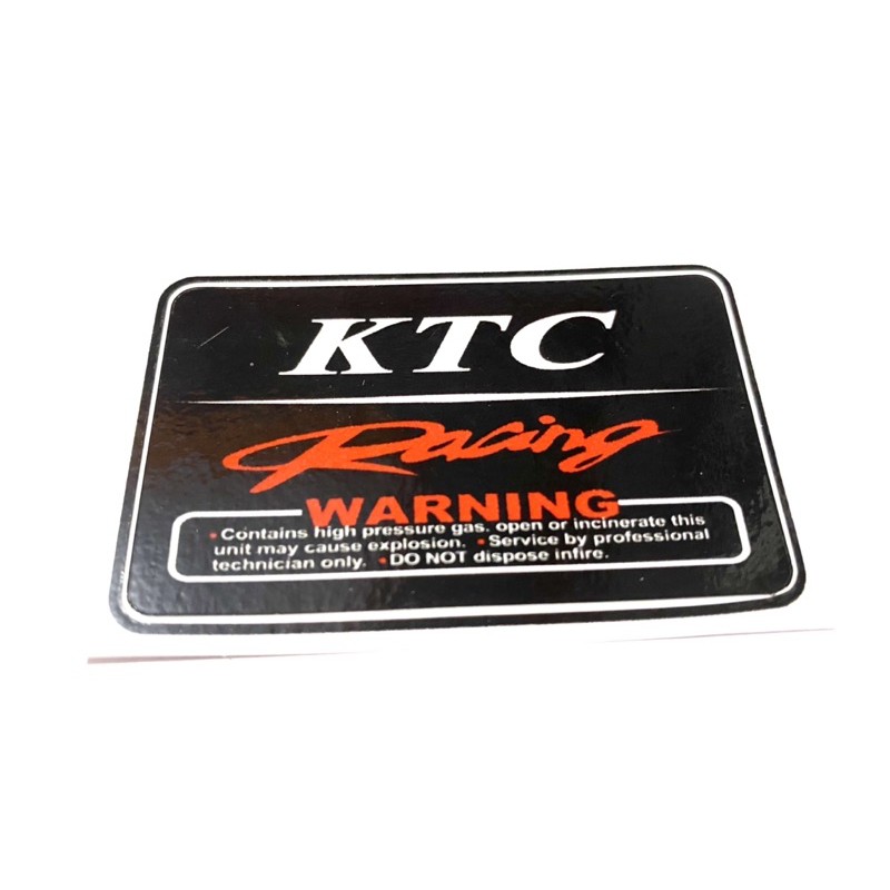 Stiker KTC Racing Warning untuk shockbreaker all motor (Harga satuan)