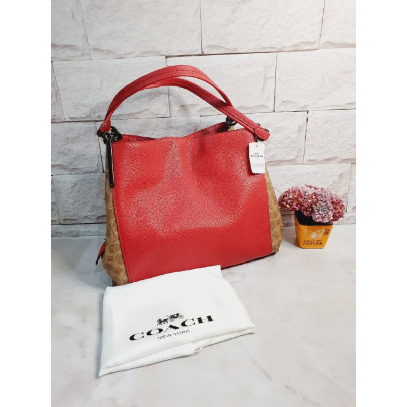 tas coach warna merah