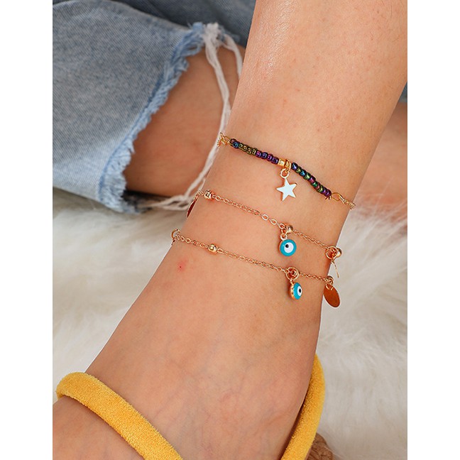 LRC Gelang Kaki Fashion Gold Mizhu Alloy Disc Eyes Hollow Star Multi-layer Anklet F78064