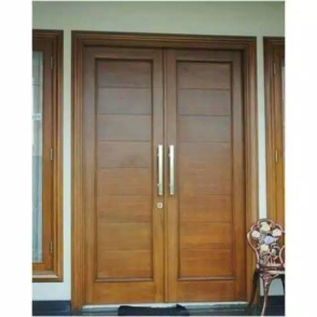 Kusen pintu rumah jati moderen kupu.kupu