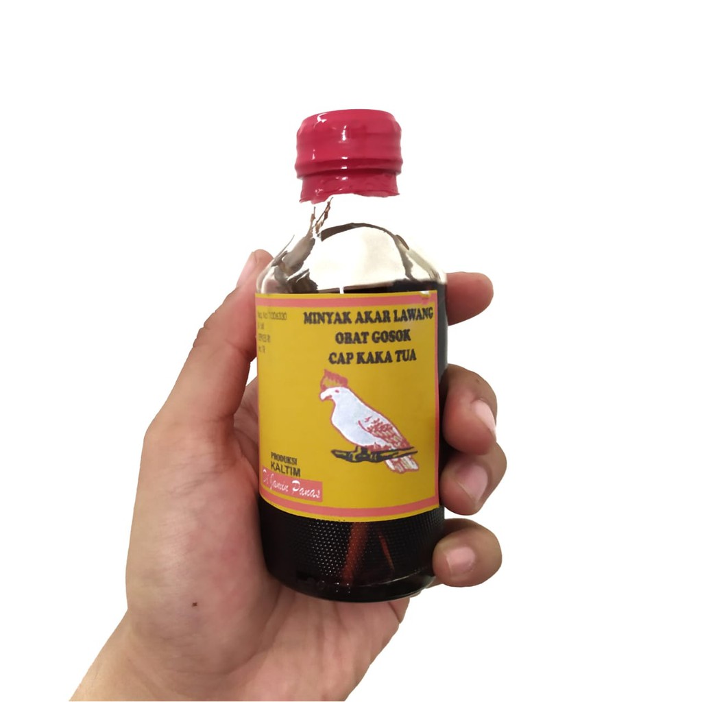 Minyak Gosok Akar Lawang Cap Kakak Tua ±130 ml