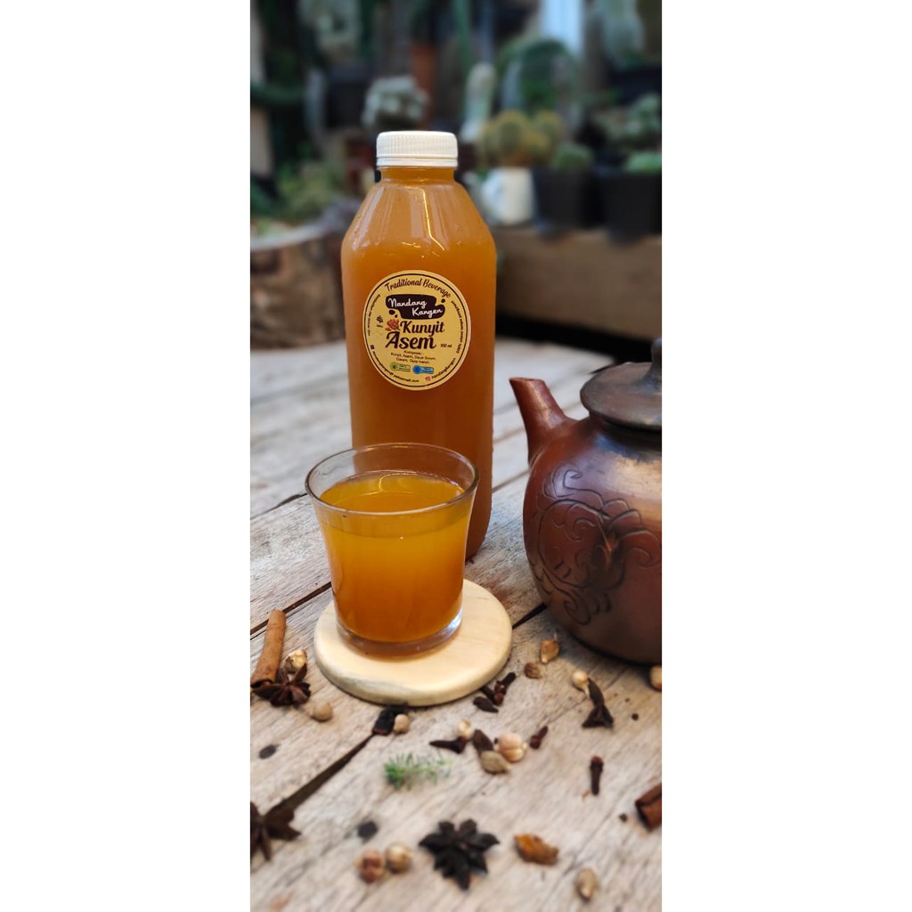 

Minuman Tradisional Kunyit Asem jamu jawa asli nandangkangen botol