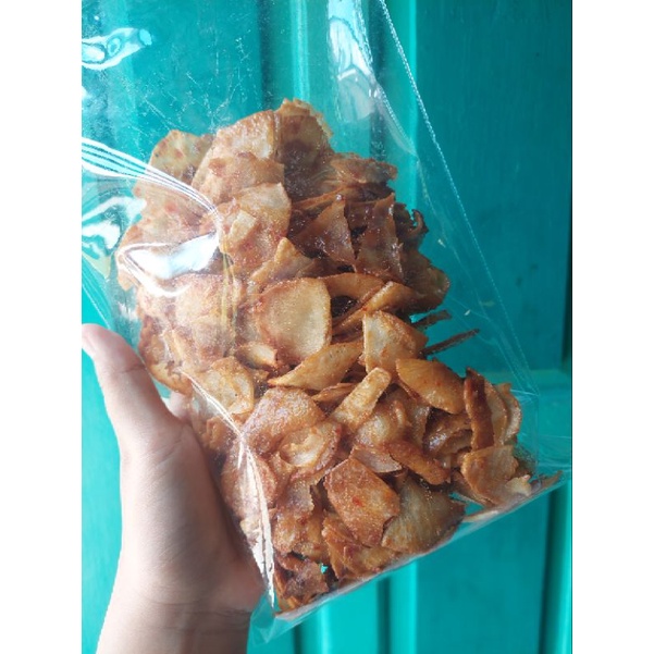 

Keripik singkong renyah pedas manis 100% cabe segar