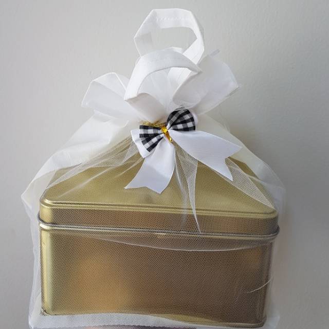 

Kantong Tile Souvenir Hampers Kaleng Kotak Packaging Hapunni