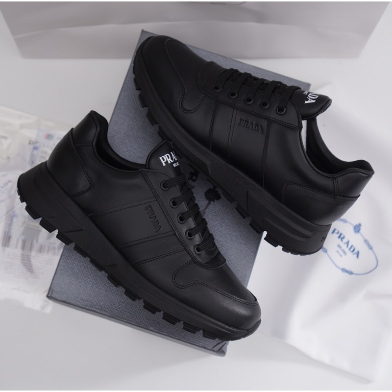triple black prada runners