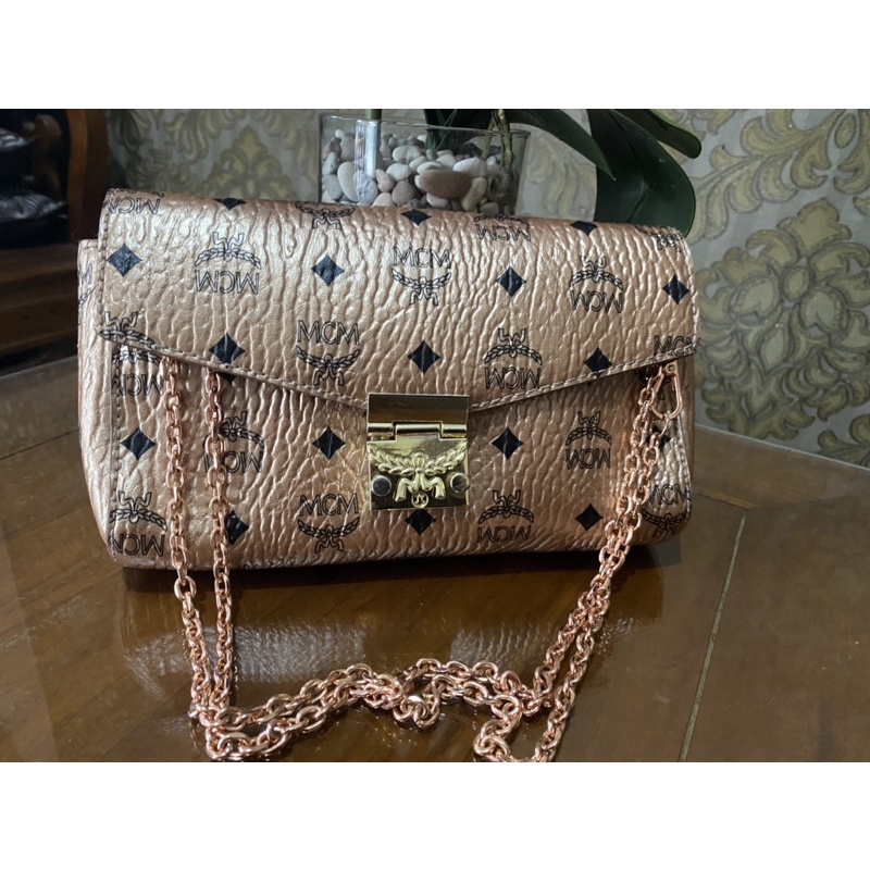 Preloved sling MCM Millie like new Authentic