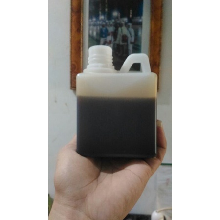 

madu hitam pahit netto 500 gram