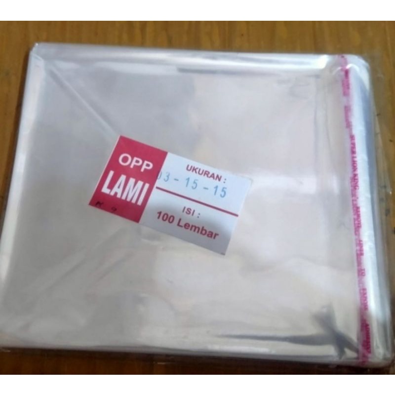 

PLASTIK OPP LEM BENING PEREKAT UK 15x15 CM ( ISI +/- 100 LEMBAR )