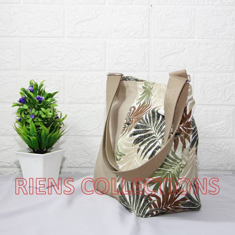 RIENS COLLECTIONS. TAS SELEMPANG SLING BAG KANVAS KOMBINASI FLORAL PALM COKLAT SLC0103