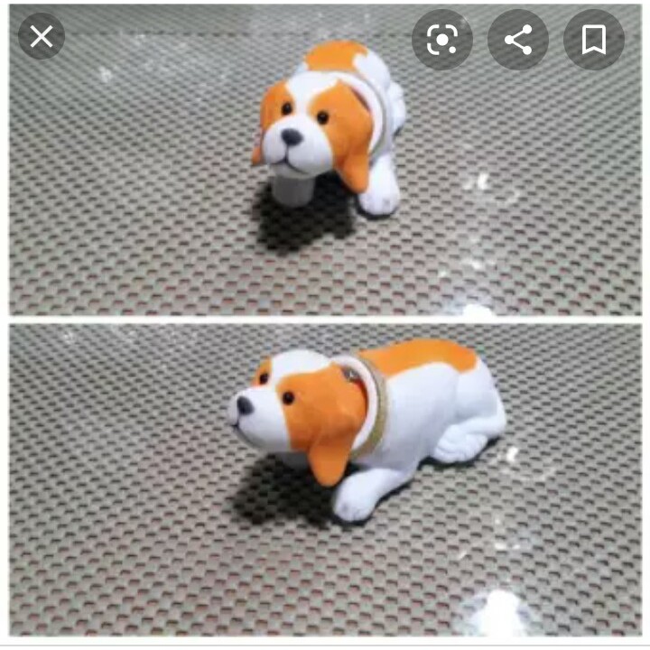 boneka anjing kepala goyang