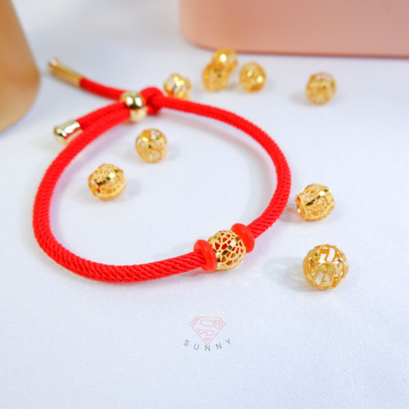 Gelang tali bola kerawang gold 375%