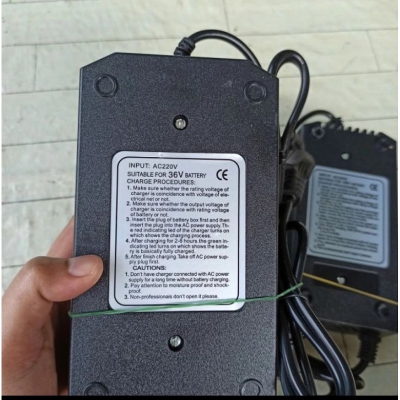 Charger sepeda listrik selis 36v charger sepeda listrik All merek original selis