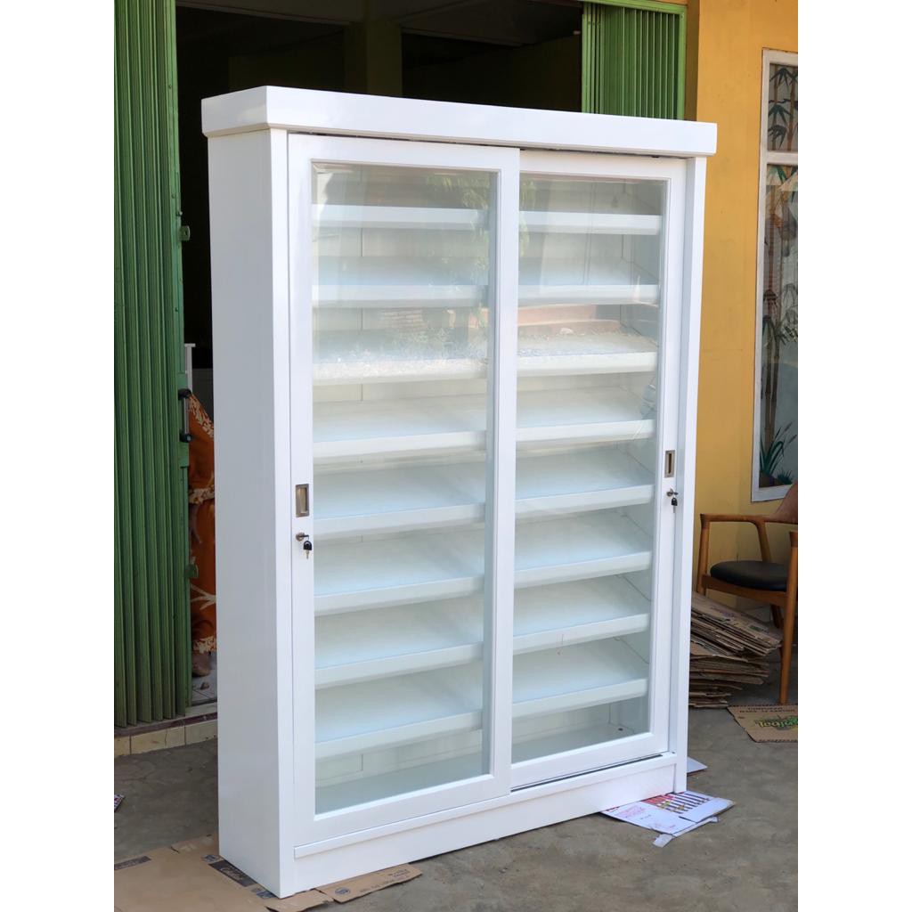 LEMARI HIAS PAJANGAN KACA FINISHING DUCO