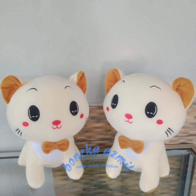 Boneka kucing duduk manis size l