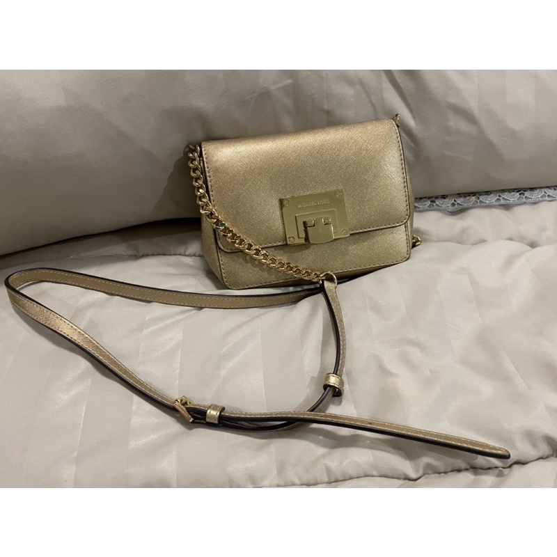 Michael Kors gold sling bag