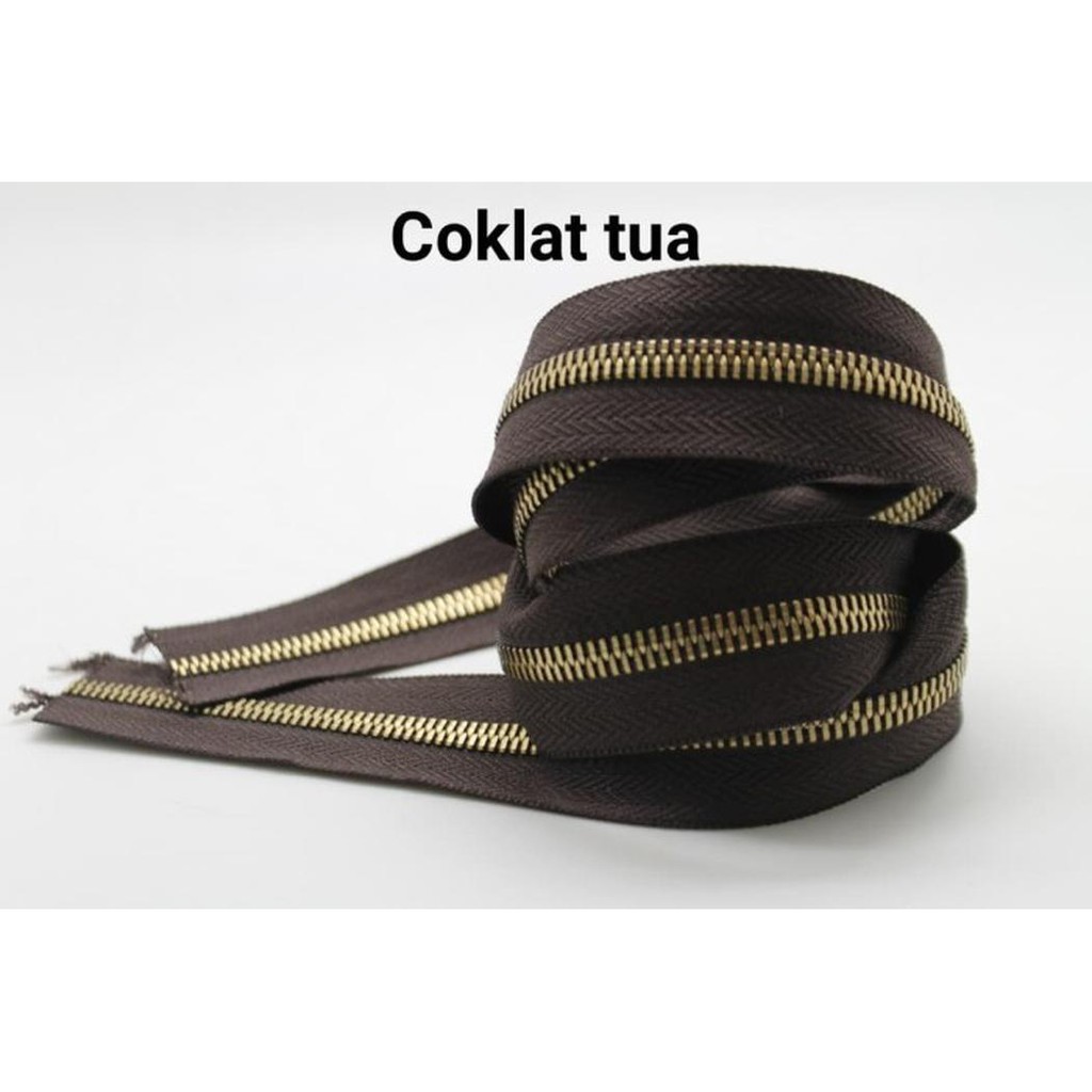 

Dijual Zipper / Resleting no. 5 Gerigi ATG Coklat Tua Limited