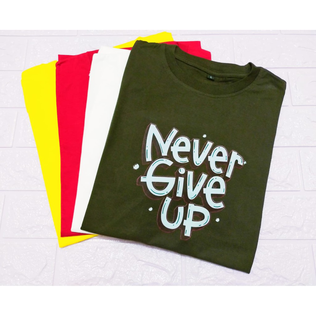 KAOS WANITA/PRIA/ UNISEX KATUN PREMIUM PROMO MURAH - NEVER GIVE UP