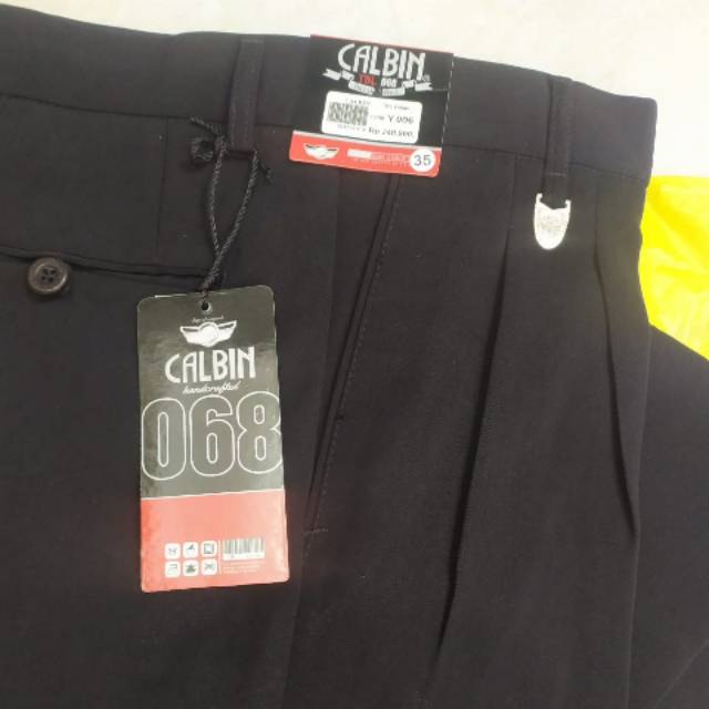 Celana bahan hitam pria merk calbin