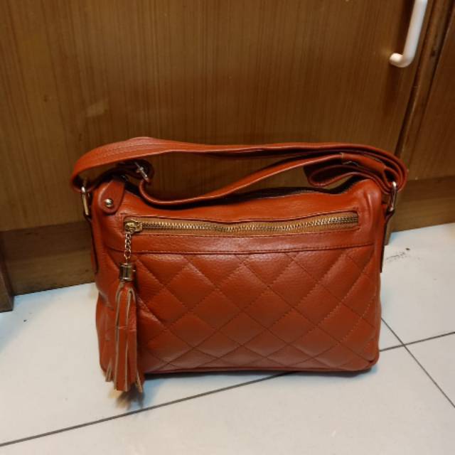 Tas wanita kulit sapi asli ketupat merah bata