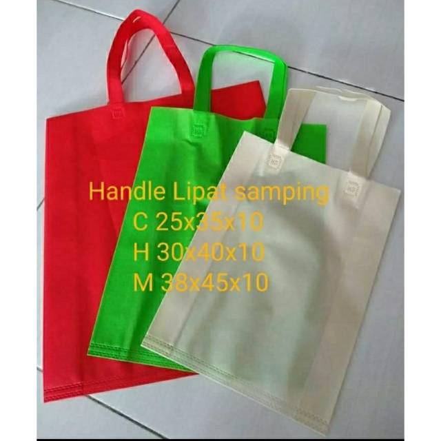 

Goodie Bag Handle lipat samping 30x40x8 TEBAL (Harga per LUSIN Isi 12pcs)