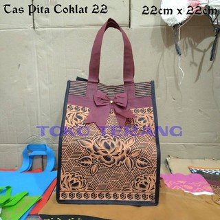 

tas hajatan spunbond pita coklat tebal 22 lusinan