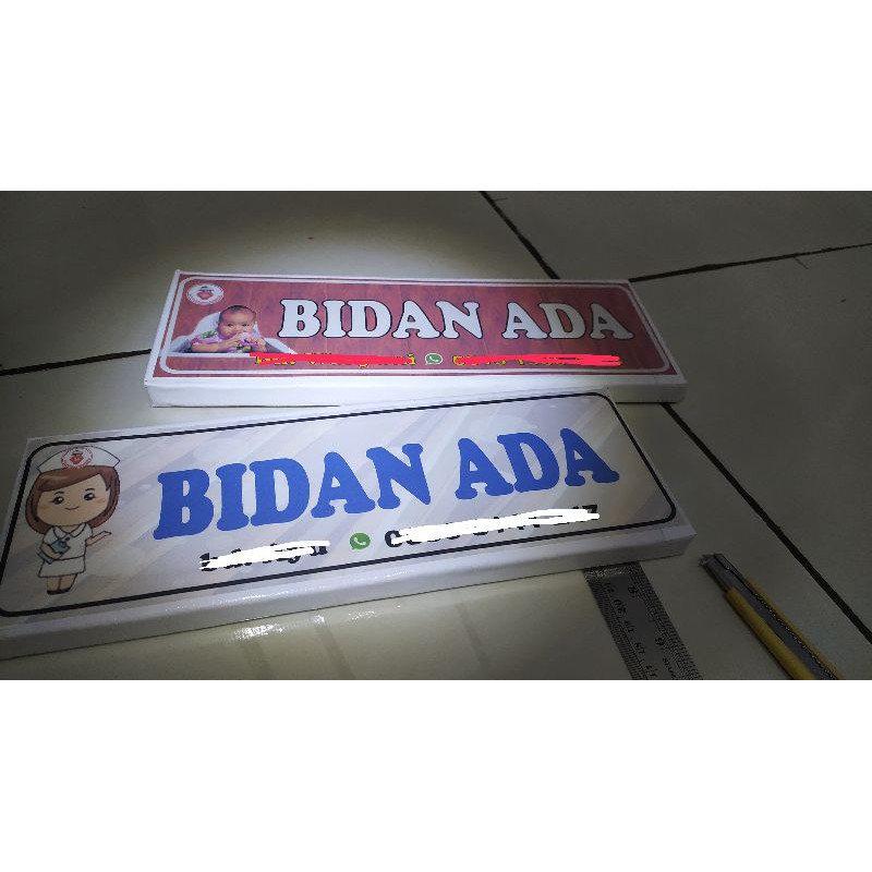 

Papan Nama Gantung 2 muka