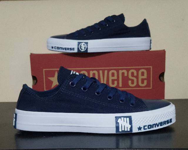 Converse AllStar Chuck Taylor Undefeated Full Motiv Navy Sepatu Sekolah
